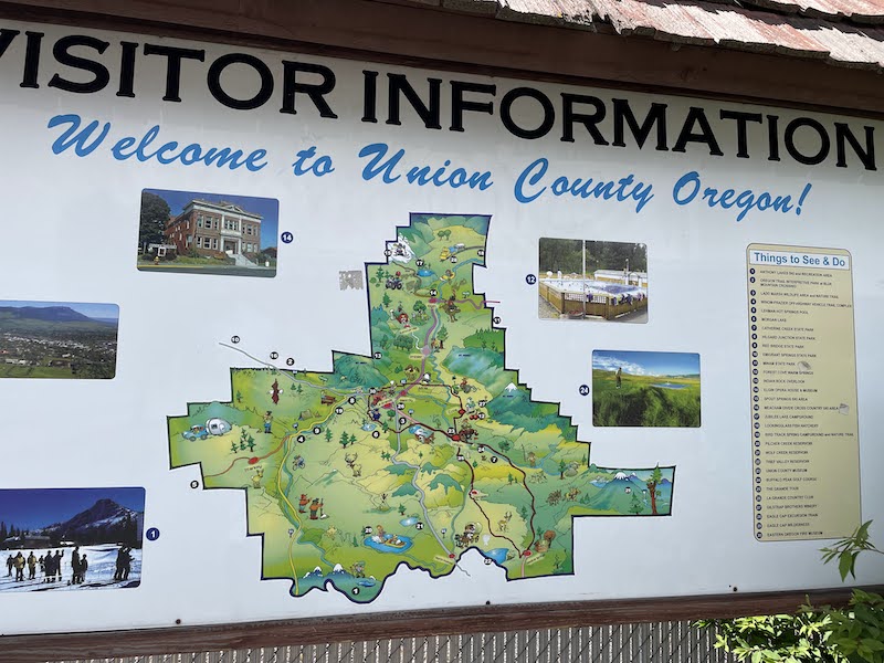 Visitor information board with a map of Le Grande