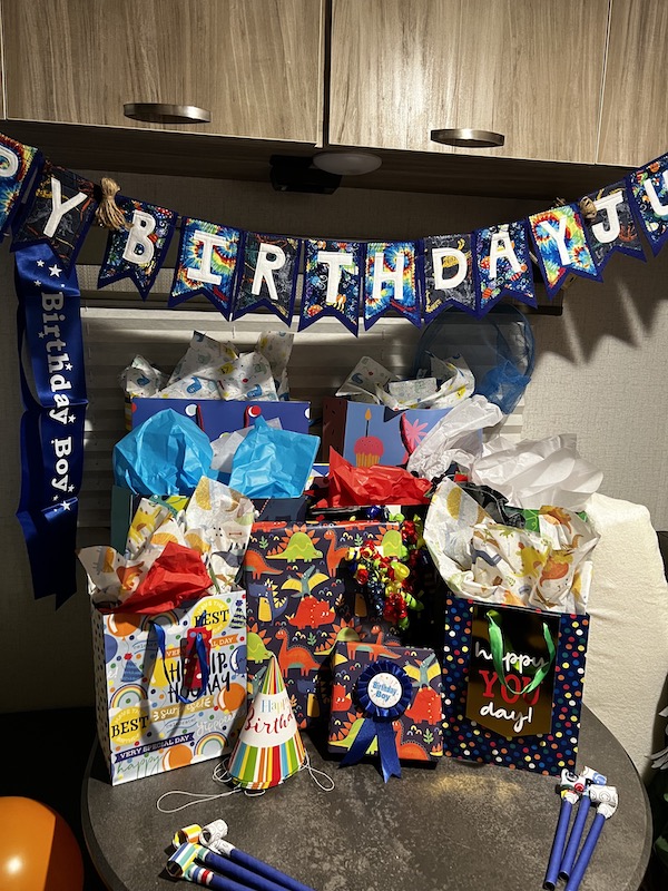 My son's birthday sign and presents on the table of our little camper