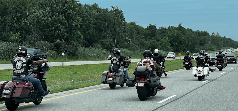 A group of Hells Angels bikers on the highway passing us