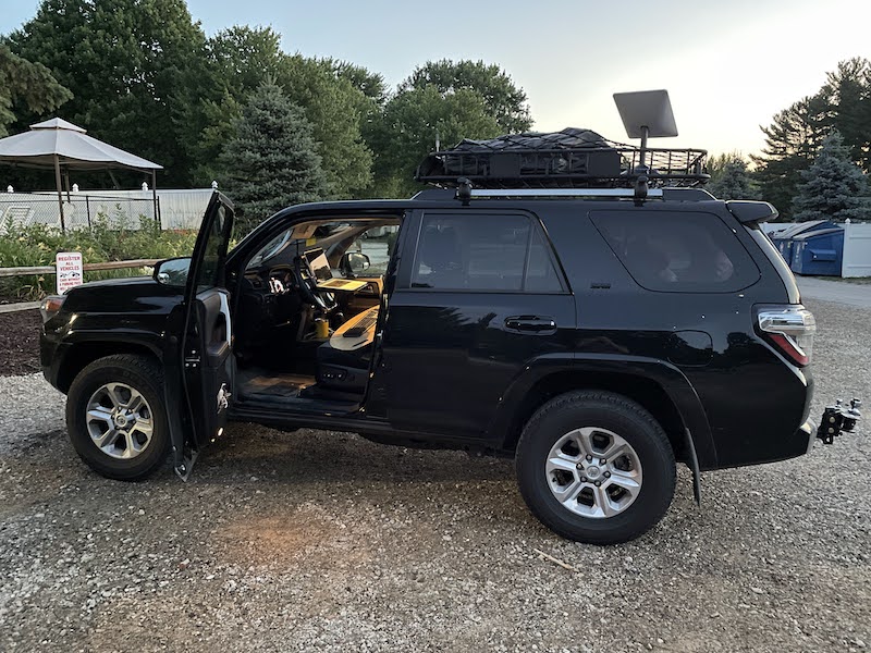 Our old 4Runner with my setup inside and Starlink on the back