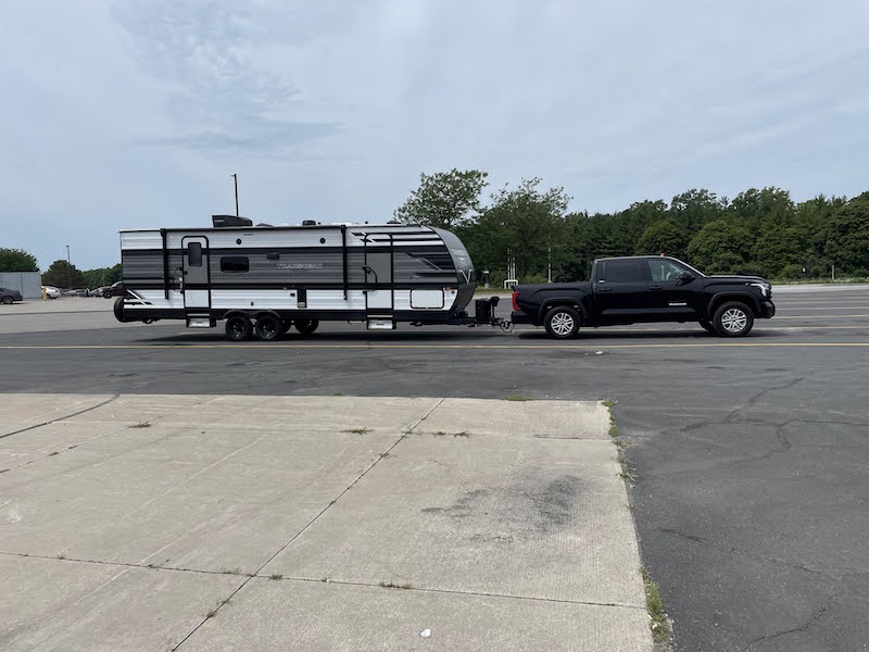 Our truck with the trailer attached, showing how the back of the truck is dipping a bit lower than I'd like